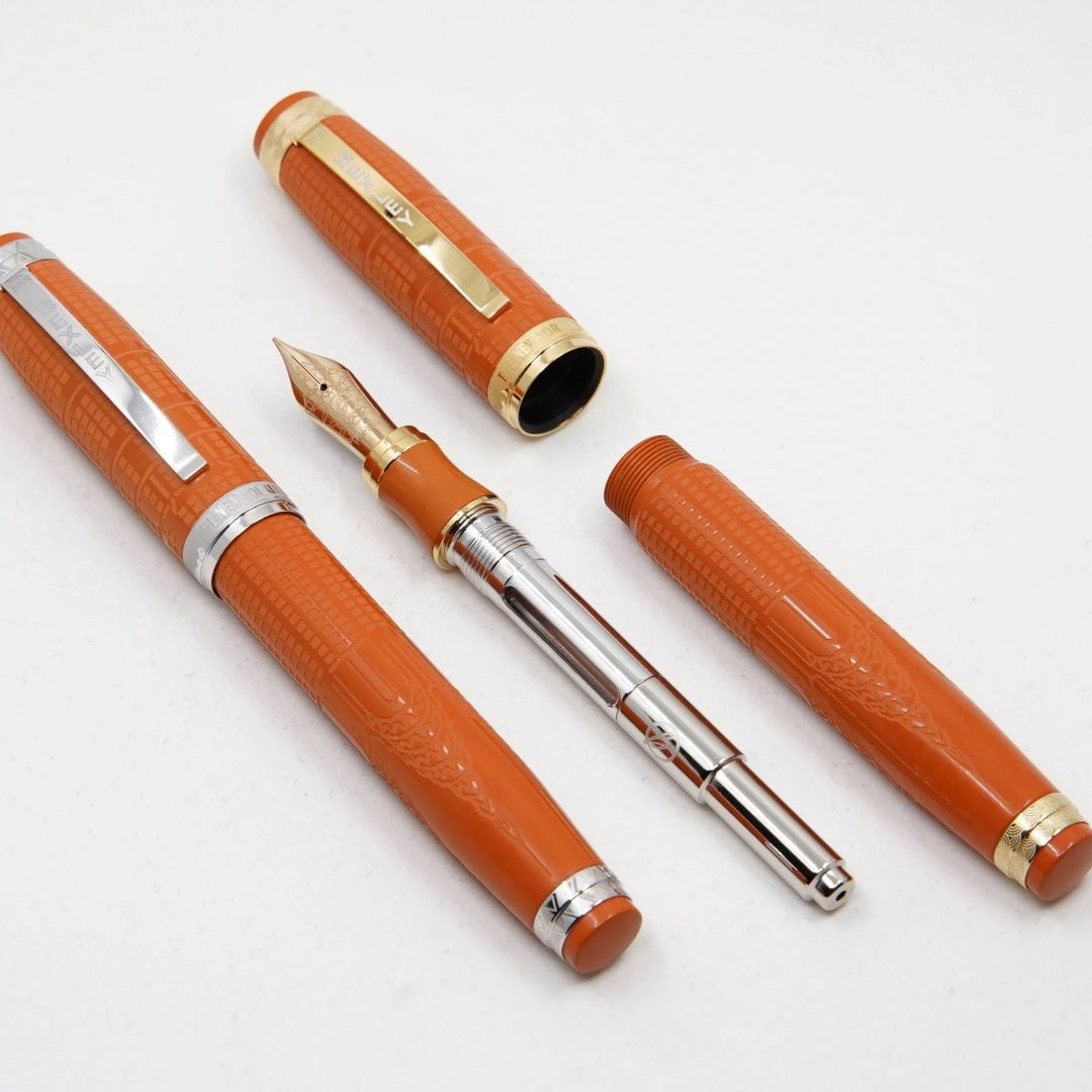 Bexley New Yorker Chrysler Building Chased - Orange Ebonite With Rhodium Trim