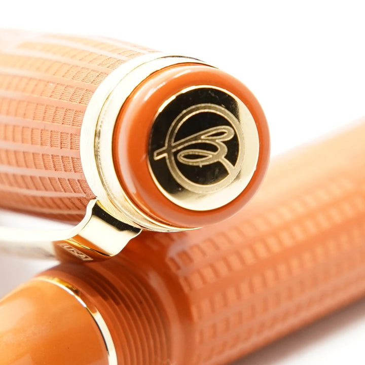 Bexley New Yorker Chrysler Building Chased - Orange Ebonite with Gold Trim