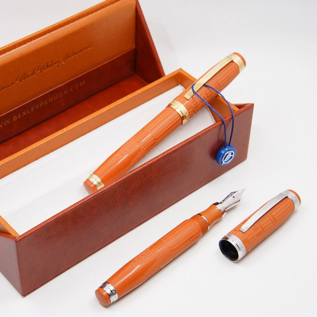Bexley New Yorker Chrysler Building Chased - Orange Ebonite with Gold Trim