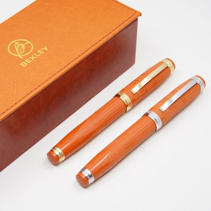 Bexley New Yorker Chrysler Building Chased - Orange Ebonite With Rhodium Trim