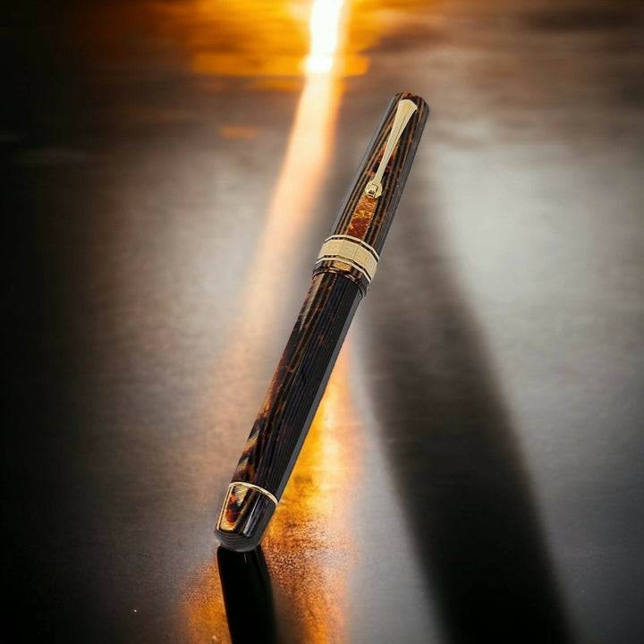 Omas Arco Brown Celluloid Rollerball with Gold Trim